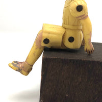 Weird, Wonderful Renwal 1940s Yellow Jointed Dollhouse Girl