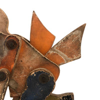 Another Jointed Wooden Man in Orange Top Coat with Wing-like Tails
