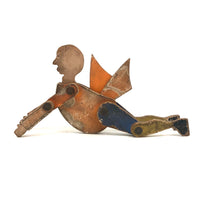 Another Jointed Wooden Man in Orange Top Coat with Wing-like Tails