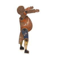 Another Jointed Wooden Man in Orange Top Coat with Wing-like Tails