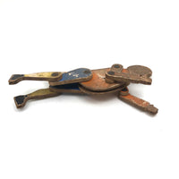 Another Jointed Wooden Man in Orange Top Coat with Wing-like Tails