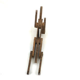 Another Jointed Wooden Man in Orange Top Coat with Wing-like Tails