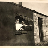 Two Young Men at Cottage Window, Black and White Snapshot