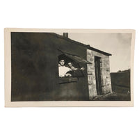 Two Young Men at Cottage Window, Black and White Snapshot