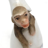 Antique Hand-painted Porcelain Bottle-Shaped Candlesnuffer with Monkey!