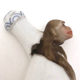 Antique Hand-painted Porcelain Bottle-Shaped Candlesnuffer with Monkey!