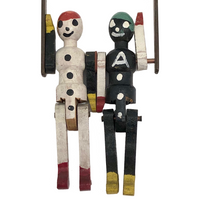 Black and White Pair of Jointed Wooden Figures on Hanger