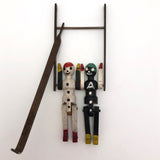 Black and White Pair of Jointed Wooden Figures on Hanger