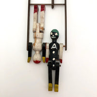 Black and White Pair of Jointed Wooden Figures on Hanger