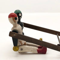 Black and White Pair of Jointed Wooden Figures on Hanger