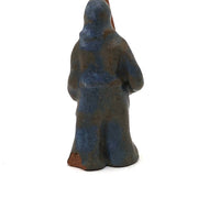 Little Blue Glazed Clay Man with Giant Blade