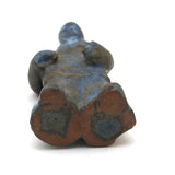 Little Blue Glazed Clay Man with Giant Blade