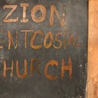 Zion Pentcostal [Sic] Church Sign on Old Slate