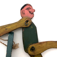 Colorful Old Wooden Acrobat Squeeze Toy on Stand