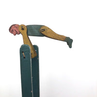 Colorful Old Wooden Acrobat Squeeze Toy on Stand