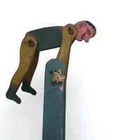 Colorful Old Wooden Acrobat Squeeze Toy on Stand
