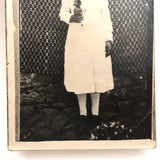 Serious Young Woman in Front of Linsey Woolsey Textile, Antique RPPC