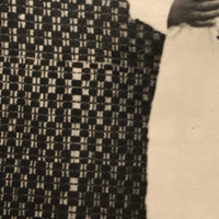 Serious Young Woman in Front of Linsey Woolsey Textile, Antique RPPC