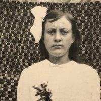 Serious Young Woman in Front of Linsey Woolsey Textile, Antique RPPC