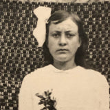 Serious Young Woman in Front of Linsey Woolsey Textile, Antique RPPC