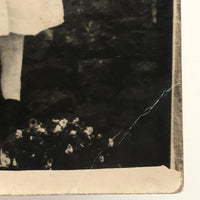 Serious Young Woman in Front of Linsey Woolsey Textile, Antique RPPC