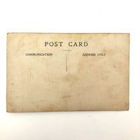 Serious Young Woman in Front of Linsey Woolsey Textile, Antique RPPC