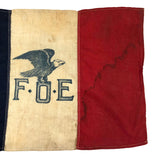 Old Fraternal Order of Eagles Cloth Flag on Wooden Post