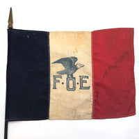 Old Fraternal Order of Eagles Cloth Flag on Wooden Post