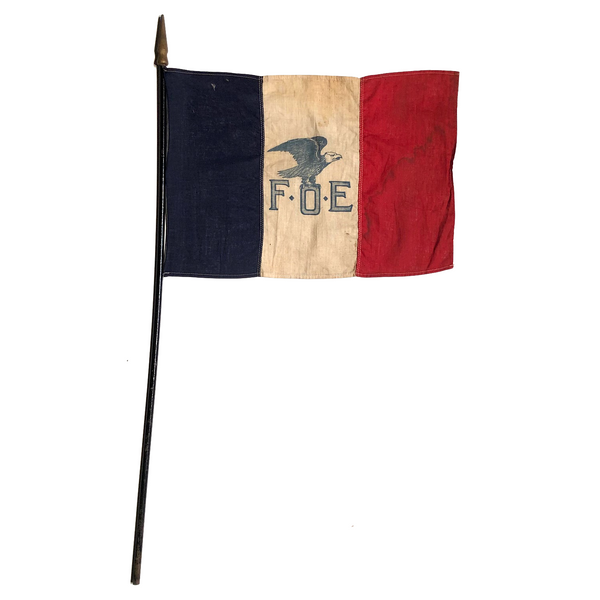 Old Fraternal Order of Eagles Cloth Flag on Wooden Post