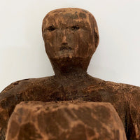 Carved Wooden Man Holding Barrel