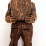 Carved Wooden Man Holding Barrel