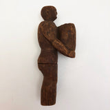Carved Wooden Man Holding Barrel