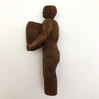 Carved Wooden Man Holding Barrel