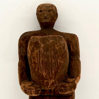 Carved Wooden Man Holding Barrel