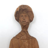 Old Carving of Old Smiling Woman with Bonnet
