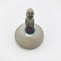 Curious Tiny Hand-painted Porcelain Asian Wise Man on Mound