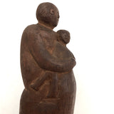 Marvelous Primitive Folk Art Carving of Parent Holding Child